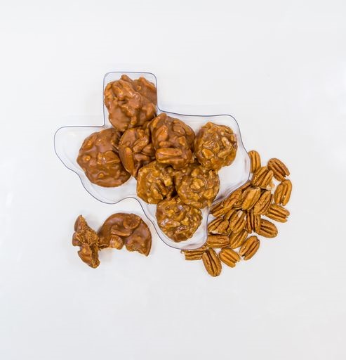 8 PECAN PRALINES IN A TEXAS SHAPE CONTAINER
